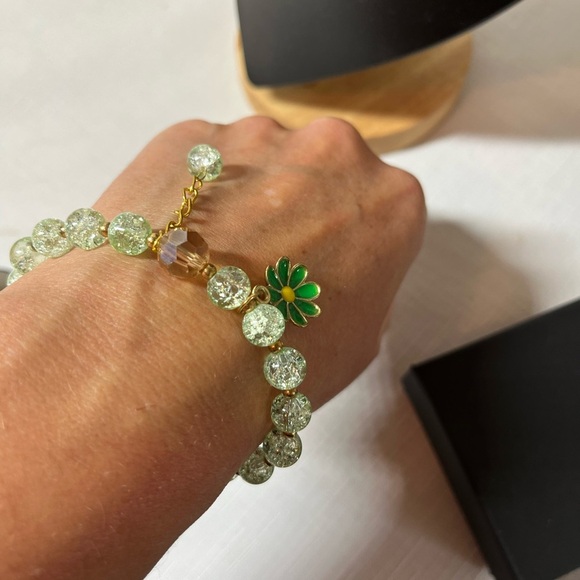 2/$15 sale. Green Beaded Stretch Bracelet with Flower Charm & hanging bead charm - Picture 4 of 5